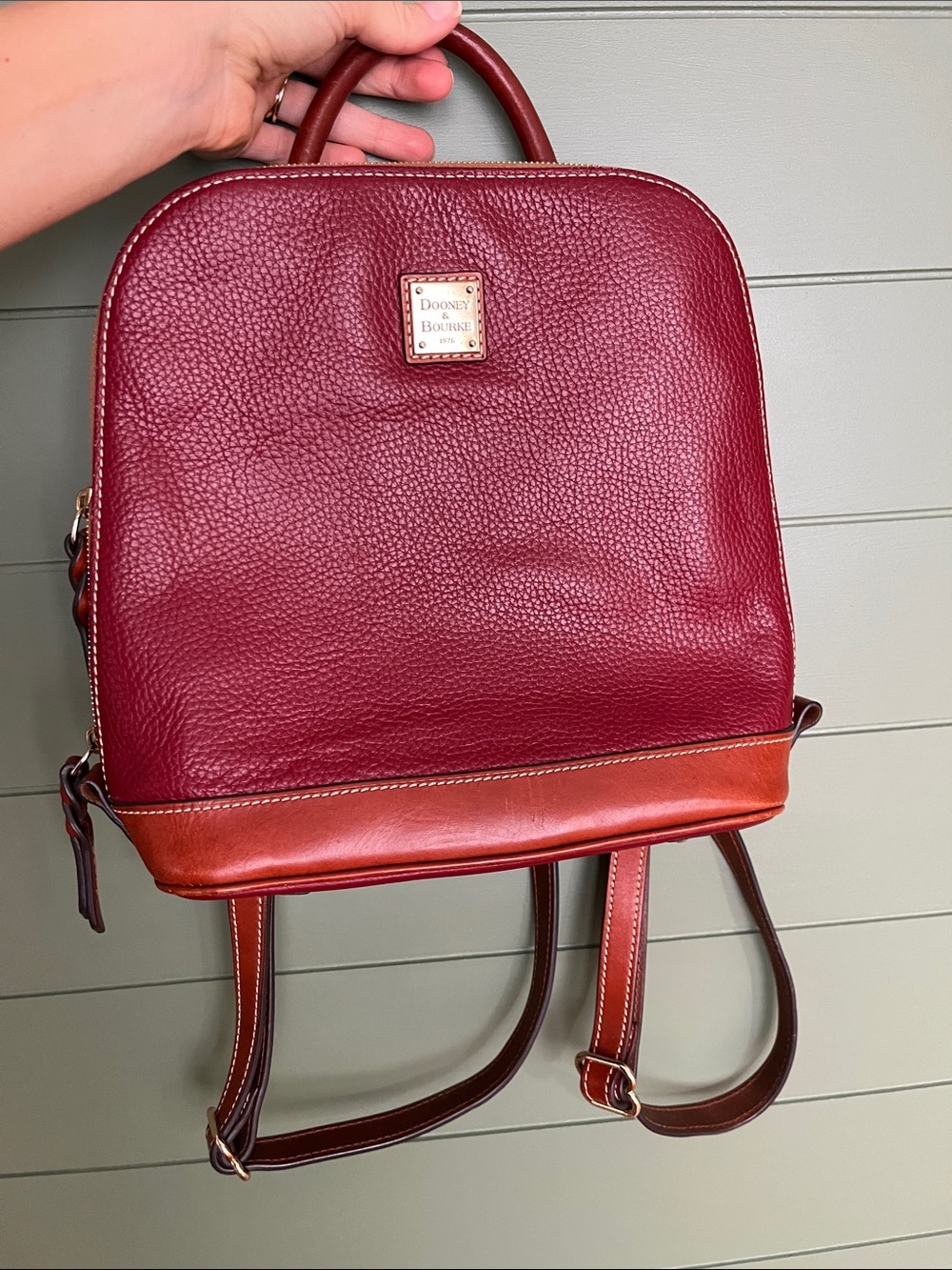 Dooney & Bourke Burgundy Pebbled Leather Backpack with Brown Trim